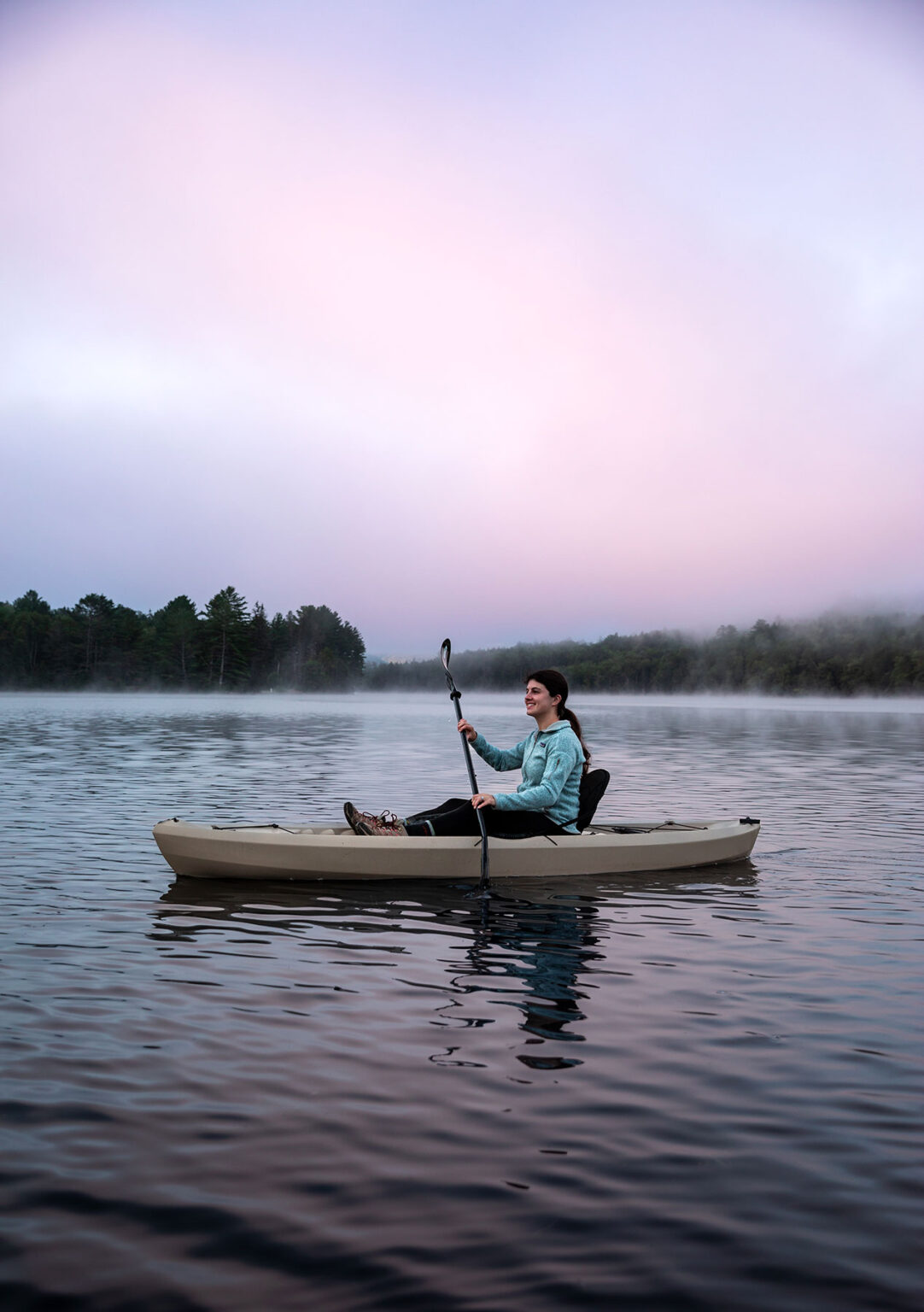 Paddling on Wyman Lake at sunrise in Maine's Kennebec Valley
